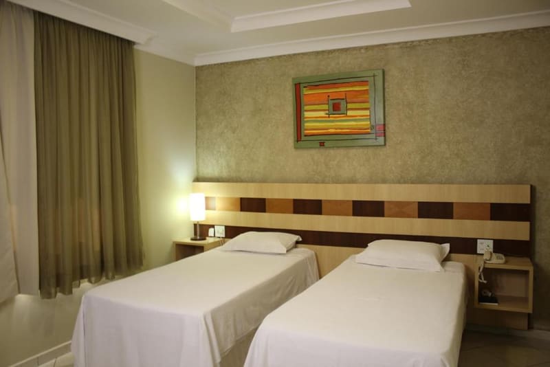 Apartamento Double Luxo com duas camas e vista para o jardim